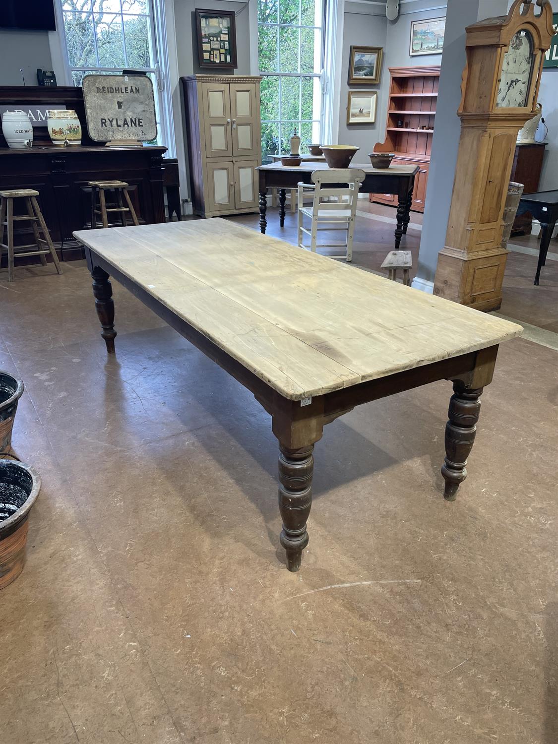 A LARGE 19TH CENTURY STAINED PINE KITCHEN TABLE WITH SYCAMORE TOP, the plain two panel top - Image 14 of 15