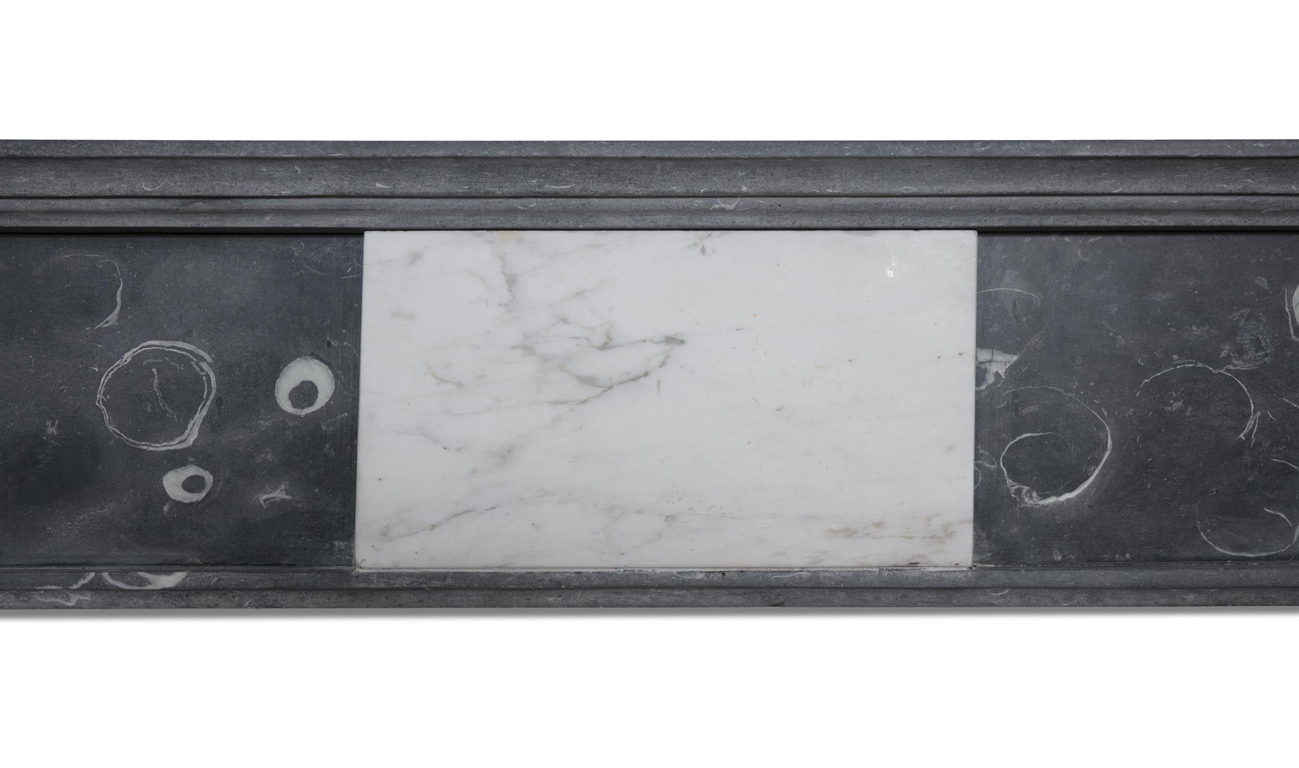 A KILKENNY BLACK MARBLE FIREPLACE C. 1800 with frieze pediment on plain column supports. - Image 3 of 13