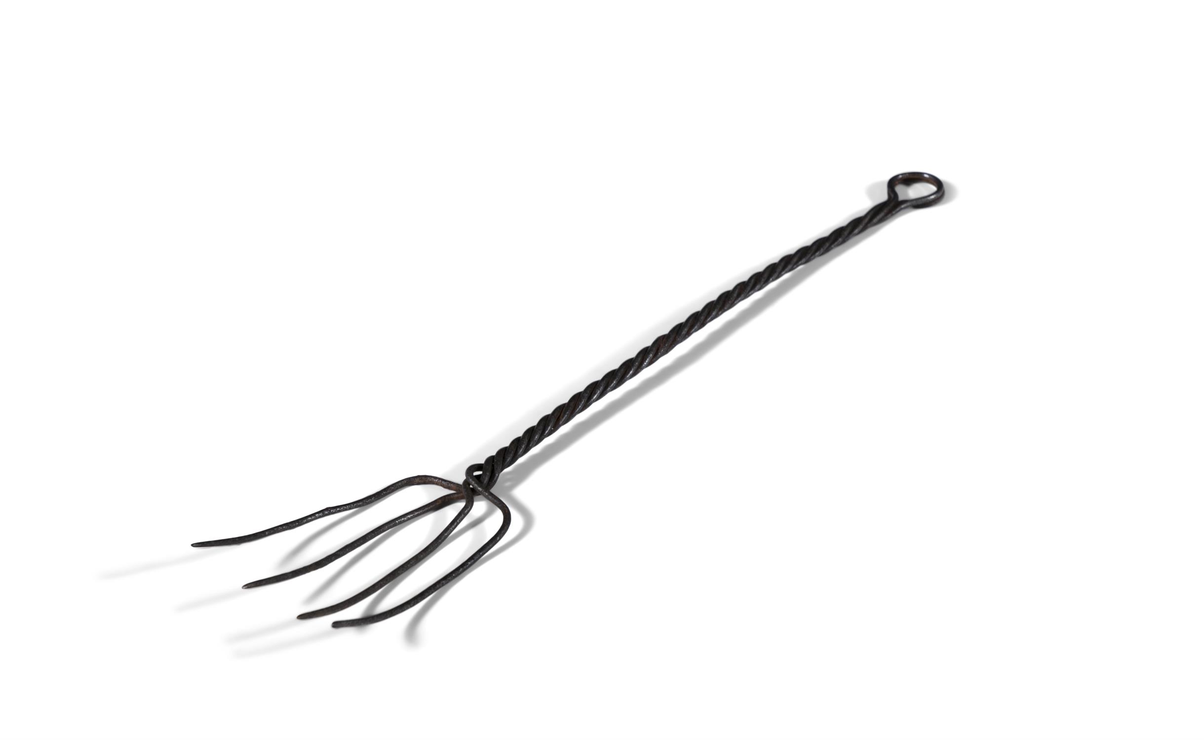 A WROUGHT IRON PRONG TOASTING FORK the four prongs entwining to form a spiral twist handle.