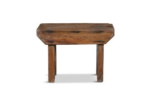 A SMALL IRISH STAINED PINE STOOL of rectangular form with plain panel supports. 23cm high, 32.