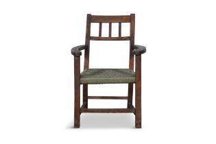 A STAINED WOOD RAILBACK SUGAN CHAIR with bowed arm supports, woven seat on square supports with