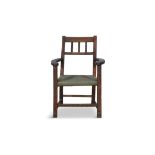 A STAINED WOOD RAILBACK SUGAN CHAIR with bowed arm supports, woven seat on square supports with