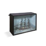A FOLK ART DIORAMA OF THREE-MASTED BARK MODEL SHIP, painted timber, contained in a framed