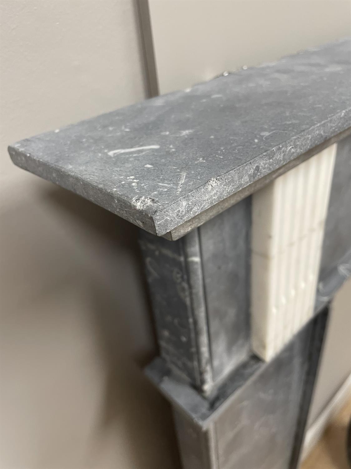 A KILKENNY BLACK MARBLE FIREPLACE C. 1800 with frieze pediment on plain column supports. - Image 6 of 13