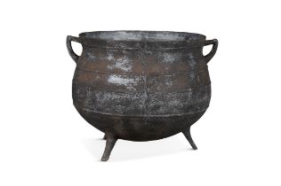 A EARLY 19TH CENTURY LARGE CAST IRON POT, of circular bulbous form, with out-turned rim,