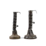 TWO LATE 18TH / EARLY 19TH CENTURY 'RAT DE CAVE' WROUGHT IRON CANDLE HOLDERS, raised on domed