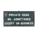 A GREEN AND WHITE PAINTED TIMBER ESTATE SIGN, 'PRIVATE ROAD, NO ADMITTANCE, EXCEPT ON BUSINESS'.