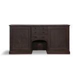 A 19TH CENTURY STAINED LOW DRESSER, three graduated central doors above an arched compartment