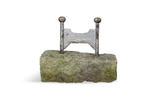 A PAINTED CAST IRON BOOT SCRAPER, with twin upright supports, on a rectangular limestone base.