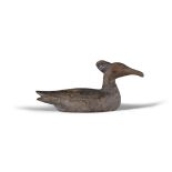 A BROWN PAINTED AND CARVED WOODEN DUCK DECOY with crown top. 16cm high, 34cm long, 13cm wide,