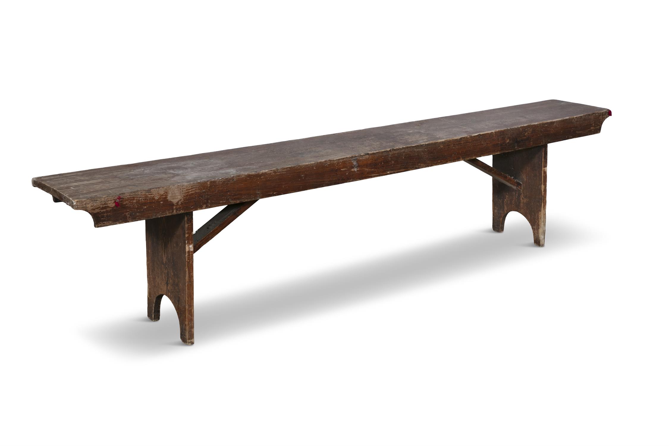 A 19TH CENTURY STAINED LONG BENCH, with plain seat above a shaped frieze with trestle feet and - Image 2 of 3