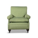 AN UPHOLSTERED MAHOGANY FRAMED EASY ARMCHAIR, ATTRIBUTED TO HOWARD & WILLOUGHBY covered in a