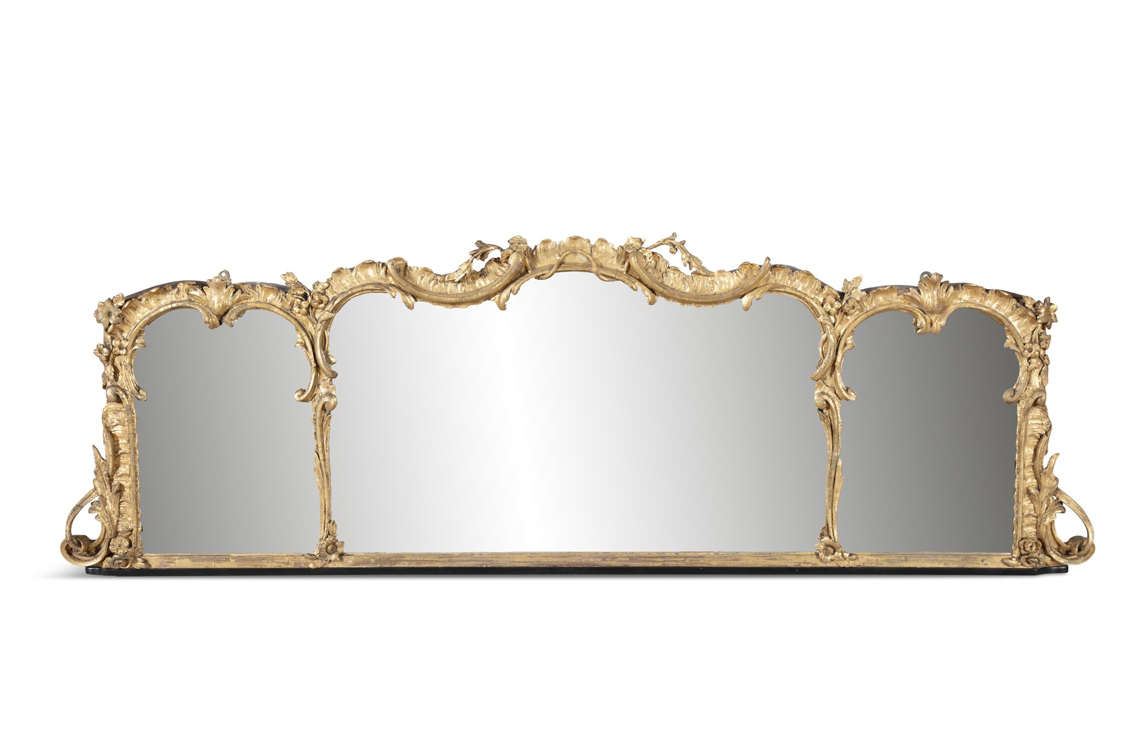AN 18TH CENTURY ROCOCO GILTWOOD AND GESSO COMPARTMENTAL OVERMANTLE MIRROR, of shaped