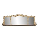 AN 18TH CENTURY ROCOCO GILTWOOD AND GESSO COMPARTMENTAL OVERMANTLE MIRROR, of shaped