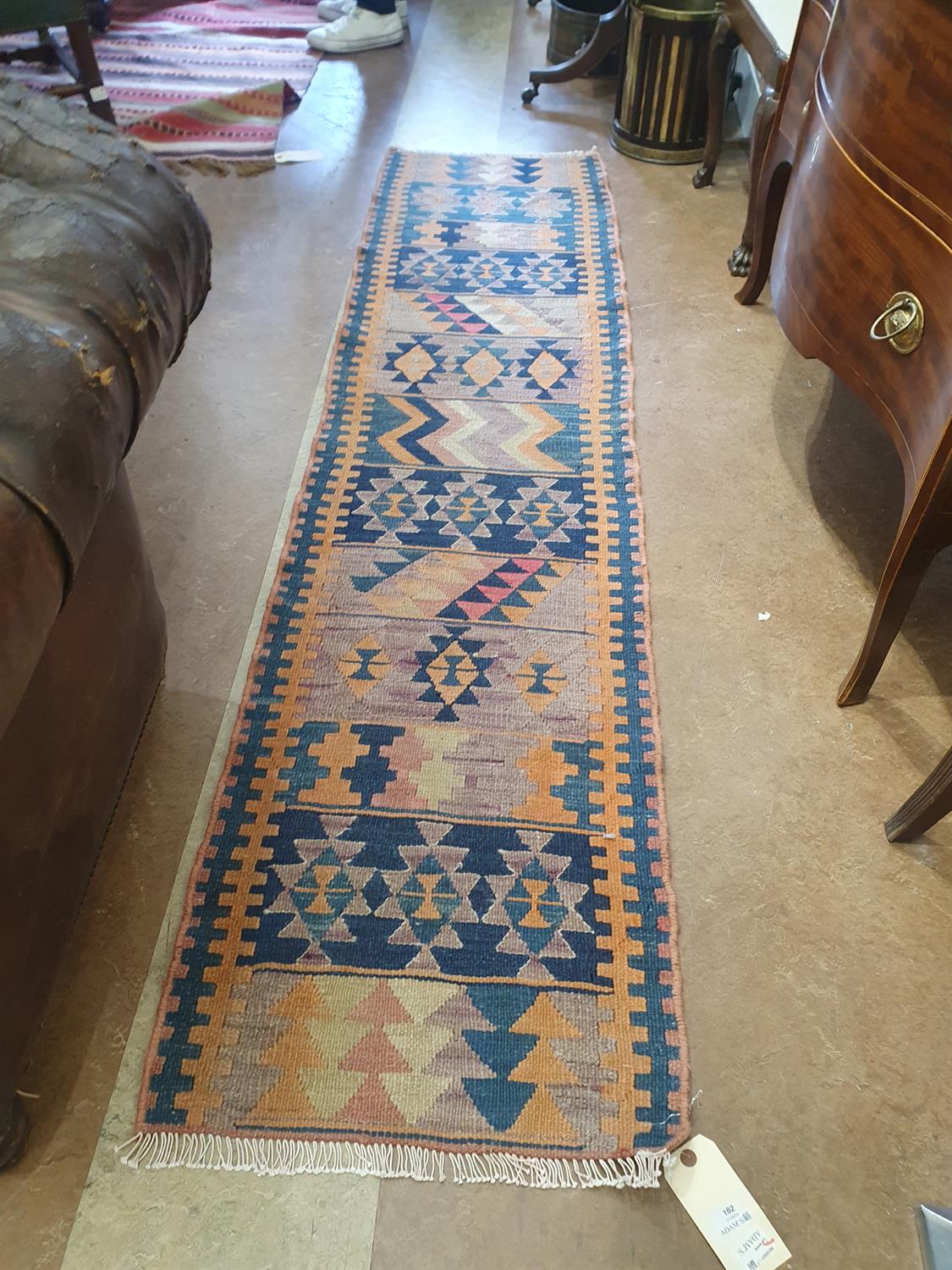 A FLAT-WOVEN KILIM RUNNER, CA. 1940s, 238 x 56cm the central reserve woven with thirteen rows of - Image 6 of 12