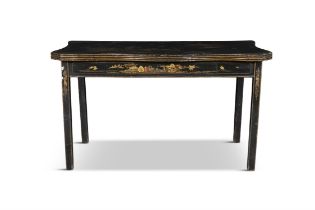 A GEORGE III JAPANNED SERPENTINE SIDE TABLE, LATE 18TH CENTURY, the top decorated depicting