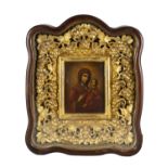 KAZANSKAY MOTHER OF GOD (RUSSIAN, 19TH CENTURY) Oil on panel, set in an elaborately carved and