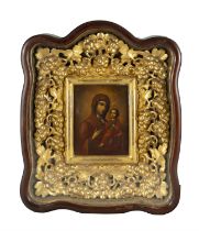 KAZANSKAY MOTHER OF GOD (RUSSIAN, 19TH CENTURY) Oil on panel, set in an elaborately carved and