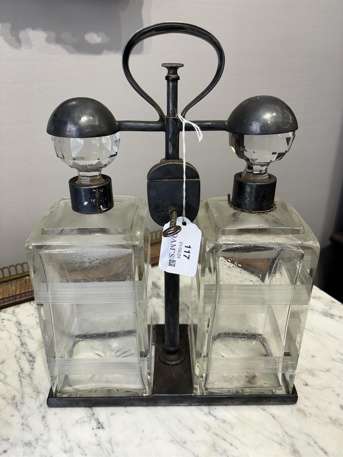 A PAIR OF SPIN TOP DOUBLE DECANTER TANTALUS BY HUKIN & HEATH each carrying frame with locking - Image 9 of 9