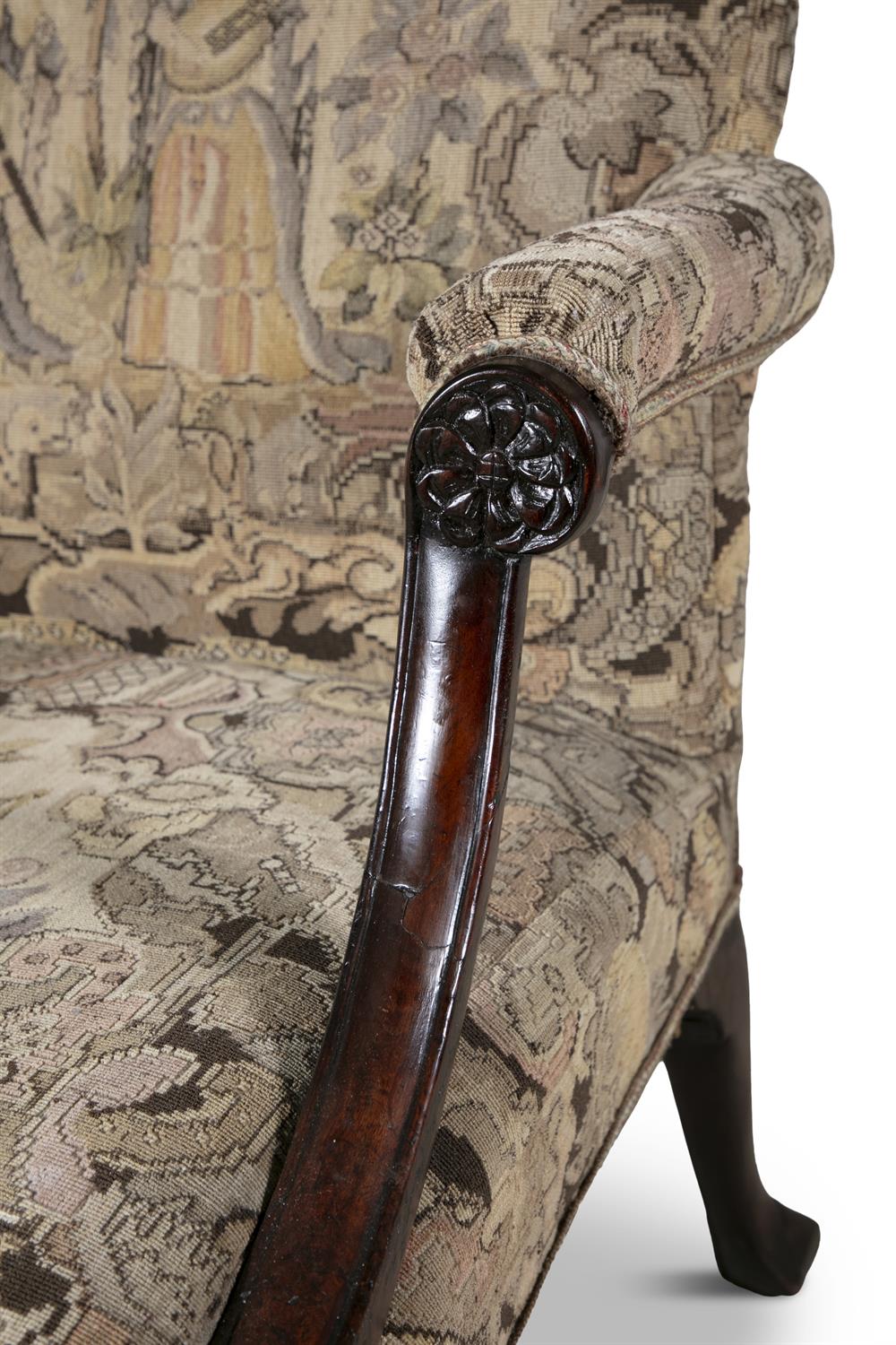 A GEORGE III MAHOGANY FRAMED GAINSBOROUGH ARMCHAIR the arched padded back and seat covered in a - Image 4 of 6