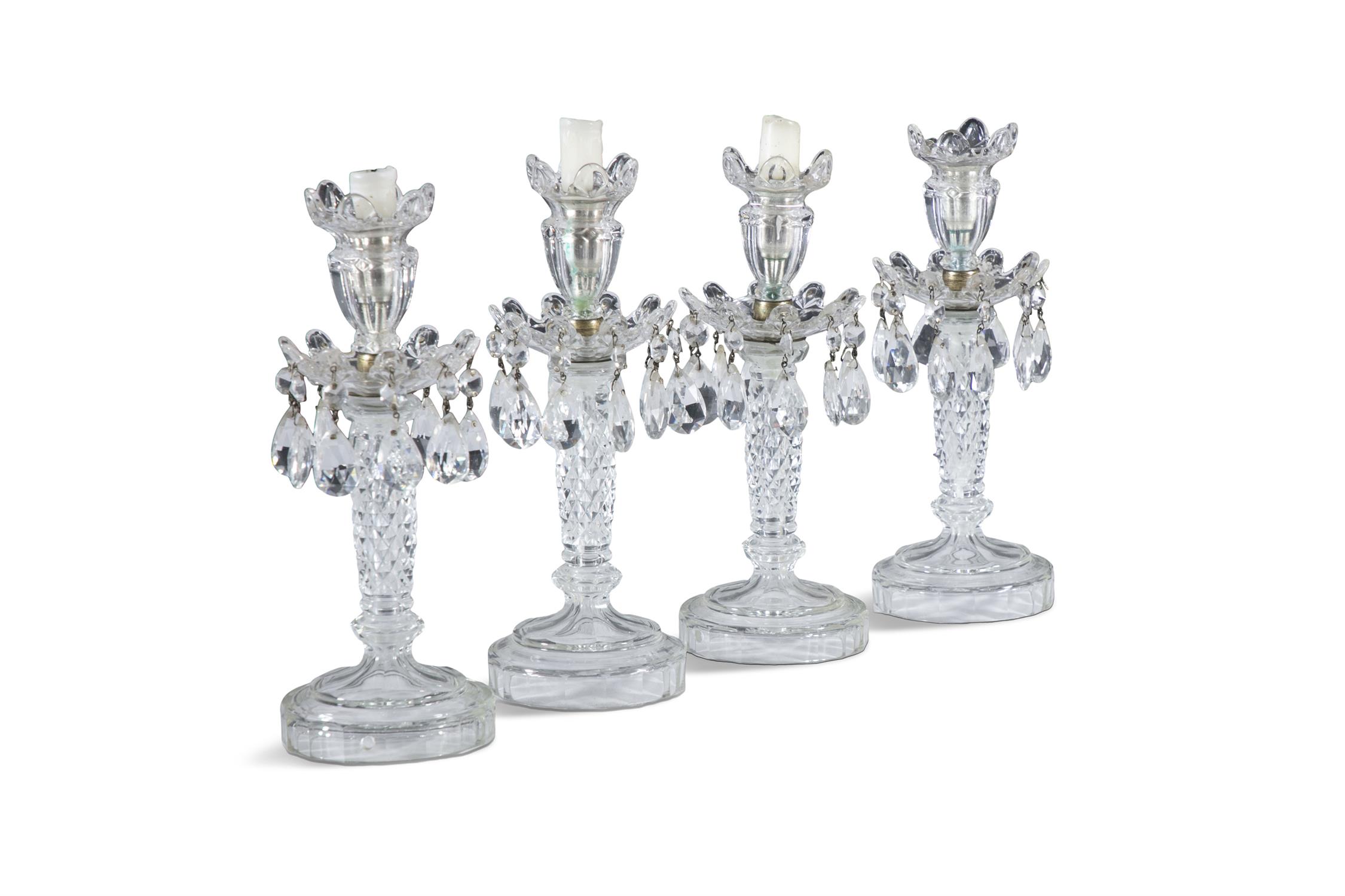 A SET OF FOUR CUT AND MOULDED GLASS LUSTRE CANDLESTICKS, 20TH CENTURY, each with flared socket - Image 2 of 3