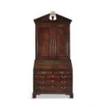 A FINE IRISH GEORGE III FIGURED MAHOGANY BLIND DOOR BUREAU BOOKCASE with an architectural