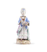 A MEISSEN PORCELAIN FIGURE OF A LADY WITH A RUFF, 19TH CENTURY 21.5cm high