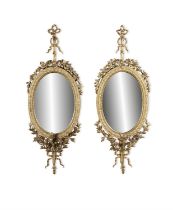 A PAIR OF GILTWOOD CREAM PAINTED GIRANDOLE MIRRORS, 19TH CENTURY each with plain oval plate