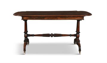 A VICTORIAN ROSEWOOD CENTRE TABLE, BY T & G SEDDON, LONDON the shaped oval top with moulded edge,