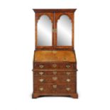 A FINE GEORGE I BURR MAPLE BUREAU BOOKCASE in the manner of Coxed & Woster, in three sections,