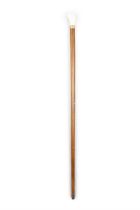 *A WALKING CANE, with carved bone 'fist handle' top in the shape of an eagle's claw grasping an