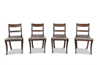 A SET OF FOUR MAHOGANY DINING CHAIRS, EARLY 19TH CENTURY, with reeded bowed tablet crest rails