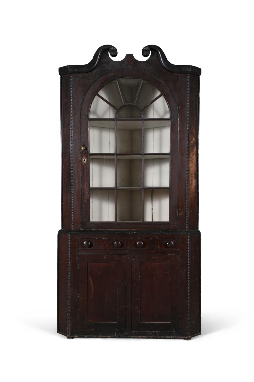 A CHIPPENDALE EBONISED AND STAINED HARDWOOD CORNER CABINET, PHILADEPHIA, CIRCA 1800,