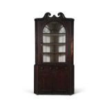 A CHIPPENDALE EBONISED AND STAINED HARDWOOD CORNER CABINET, PHILADEPHIA, CIRCA 1800,