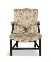 A MAHOGANY LIBRARY OPEN ARMCHAIR, PHILADELPHIA, CIRCA 1760 the hump back, armrests and seat