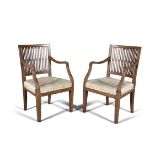 A PAIR OF GEORGE III MAHOGANY OPEN ARMCHAIRS, LATE 18TH CENTURY, the square backs filled with