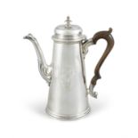 A GEORGE II SILVER COFFEE POT, London 1736, mark of J. Smith, of plain circular tapering form,