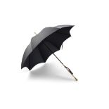 *A VICTORIAN UMBRELLA WITH IVORY CARVED HANDLE, the handle carved with vine leaves and