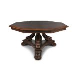 A VICTORIAN ROSEWOOD OCTAGONAL BREAKFAST TABLE, with stepped moulded rim, on carved scroll