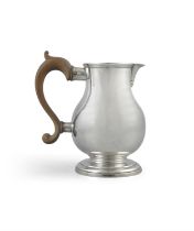 A GEORGE II PROVINCIAL SILVER BEER JUG, Exeter c.1759, maker's mark of Sampson Bennett of