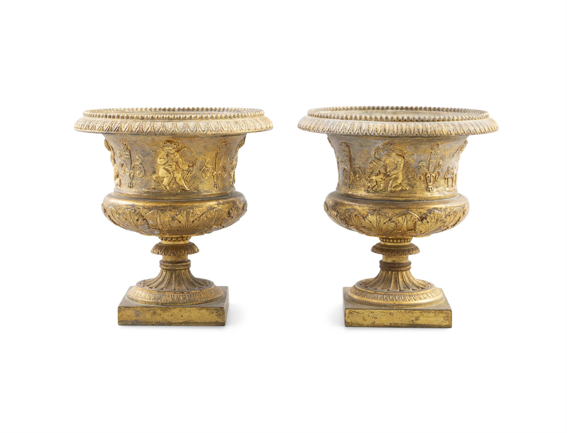 A PAIR OF FINE ORMOLU SMALL CAMPAGNA SHAPED URNS, early 19th Century, beaded palette rims,