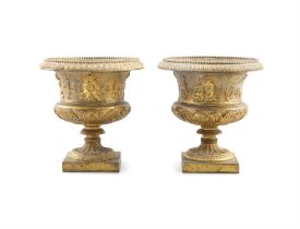 A PAIR OF FINE ORMOLU SMALL CAMPAGNA SHAPED URNS, early 19th Century, beaded palette rims,