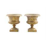 A PAIR OF FINE ORMOLU SMALL CAMPAGNA SHAPED URNS, early 19th Century, beaded palette rims,