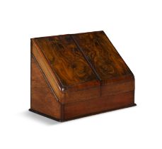 A MAHOGANY SLOPEFRONT DESK ORGANISER, enclosing a fitted interior. 30 cm high, 38.5 cm wide,