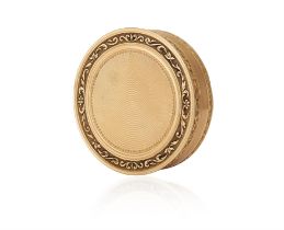 A FRENCH GOLD SNUFF BOX of circular form, the rim with foliate scroll decoration,