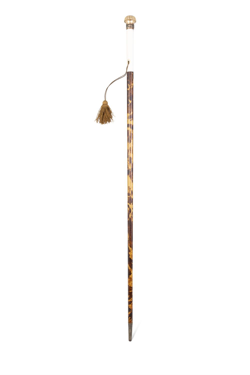 *A WALKING CANE, 19TH CENTURY with gilt metal top, inscribed with crest, with ivory and faux