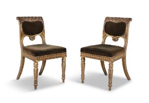 A PAIR OF GEORGE IV GILTWOOD CHAIRS, C.1825 IN THE MANNER OF MOREL AND SEDDON each scroll back