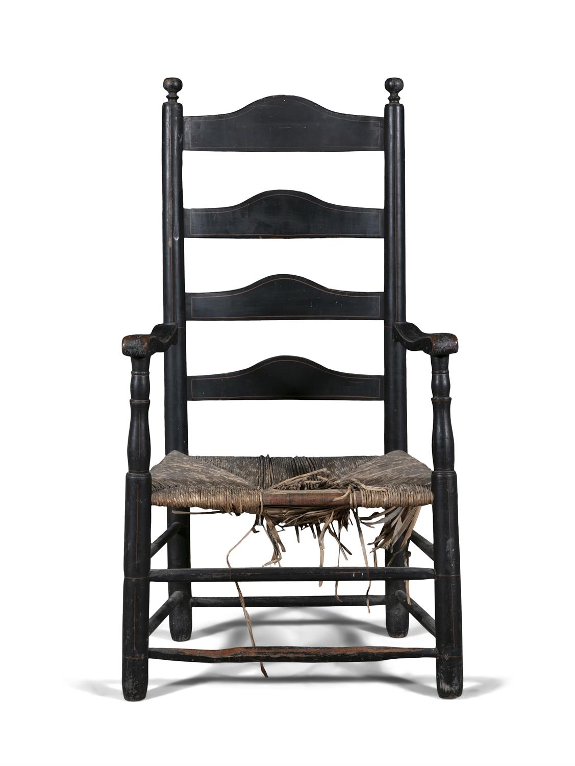 AN EBONISED WINDSOR ARMCHAIR, PENNSYLVANIA LATE 18TH CENTURY humpback back splats flanked by