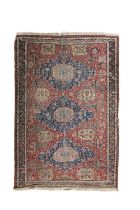 A CAUCASIAN FLAT WOVEN CARPET, 19TH CENTURY. 300 X 220CM the large centre field woven with three