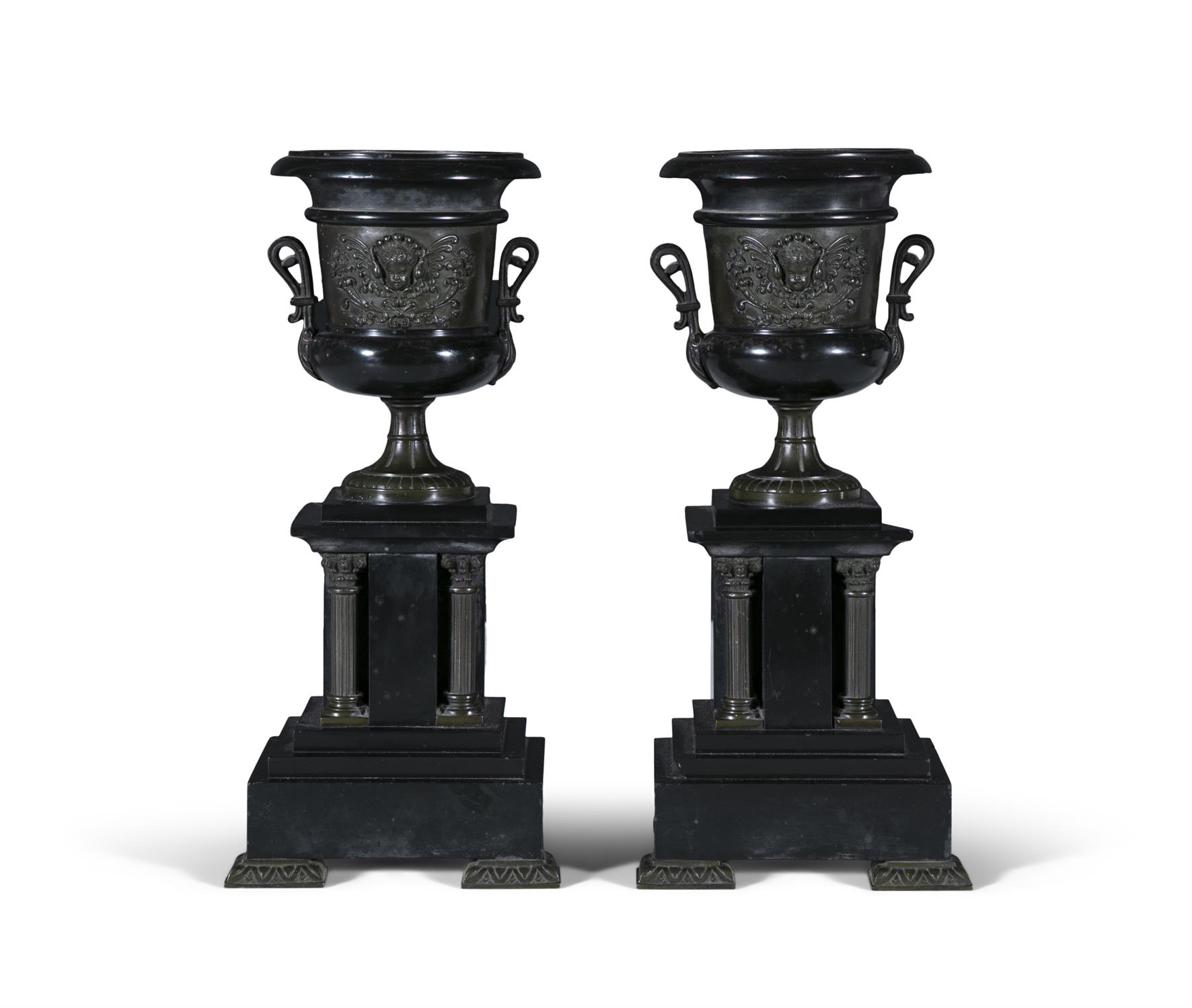 A PAIR OF LATE VICTORIAN BRONZED BLACK MARBLE URNS OF CLASSICAL FORM, 36.5cm high